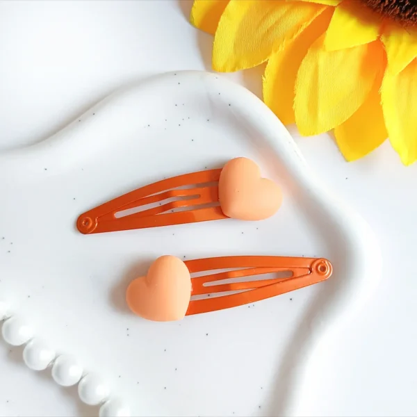 Spinki dla dzieci pomarańczowe serduszka.