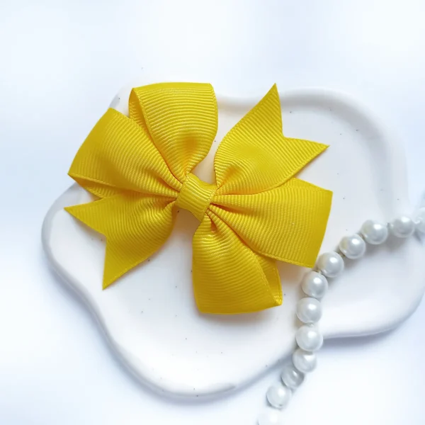 Kokarda dla dzieci ze wstążki rypsowej żółta.